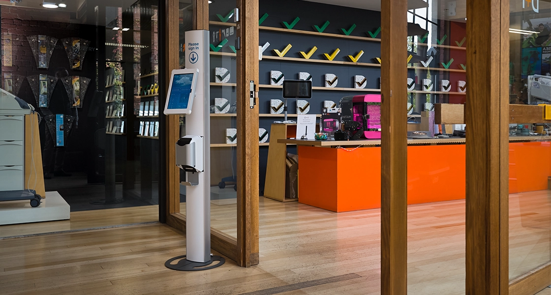 White Digital Kiosk in a Modern Retail Space | Sprocket
